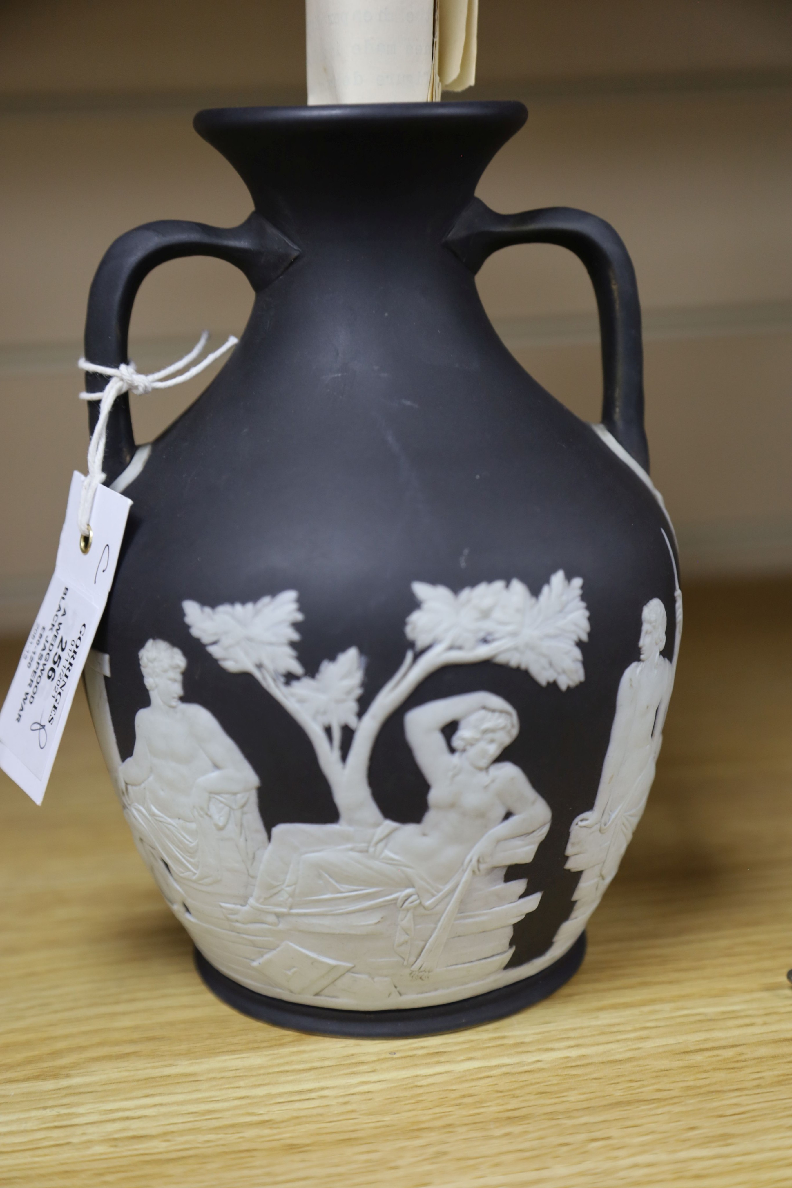 A Wedgwood black Jasper ware copy of the Portland vase, first half 19th century, 20cm